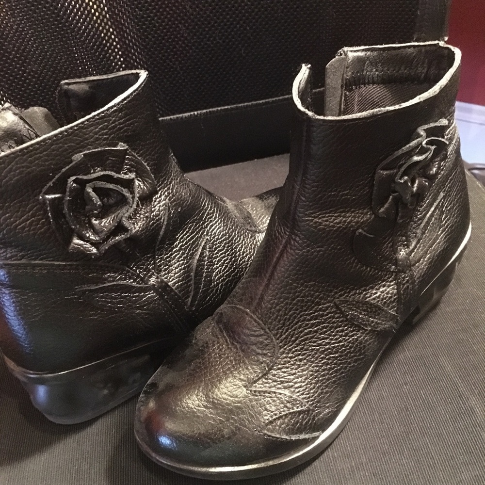 Black leather rosette booties